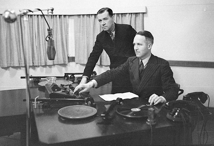 SLNSW_11003_Radio_station_2GZ_Two_men_operating_the_panel_and_turntable